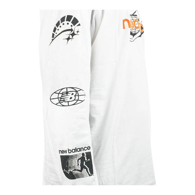 New Balance Men's Relaxed Global Longsleeve 3