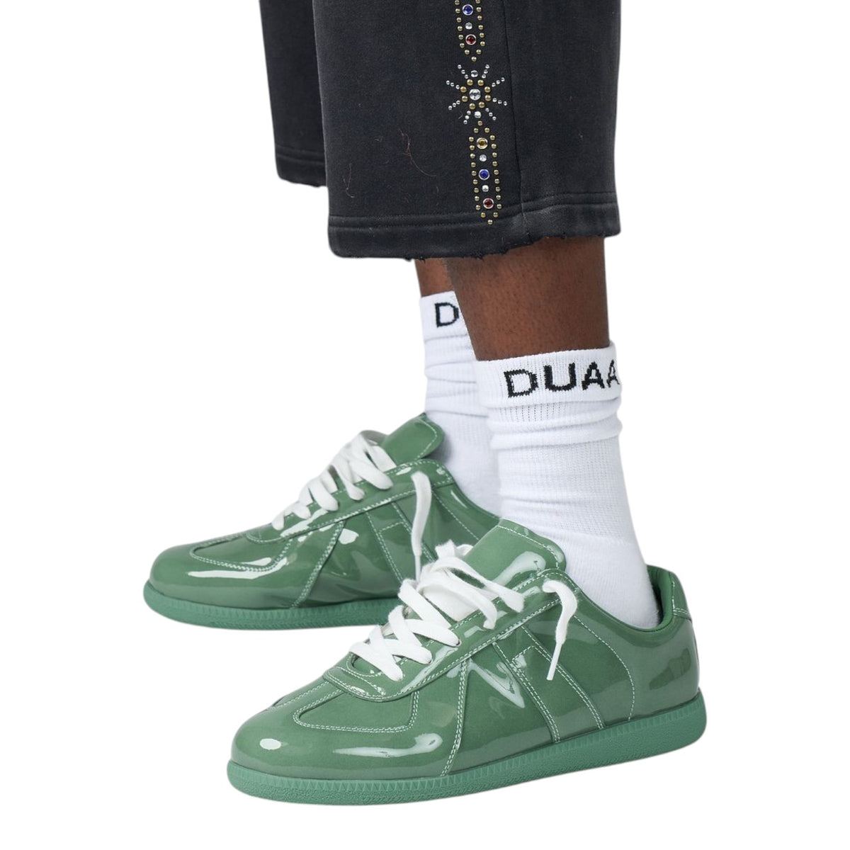 City Jeans Duaa low-profile trainer in sage green patent leather with white laces and tonal rubber sole